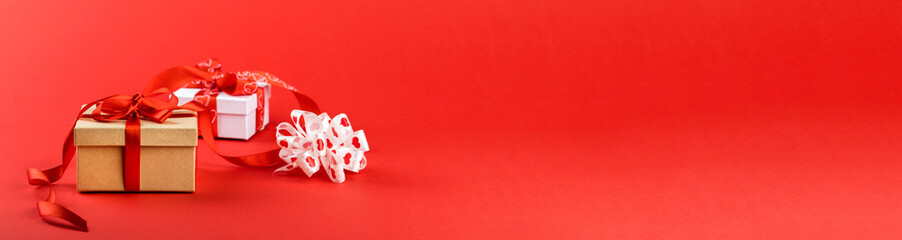  Gift Box with ribbon Red Background Valentines Day Present.Copy space.Banner  Panorama