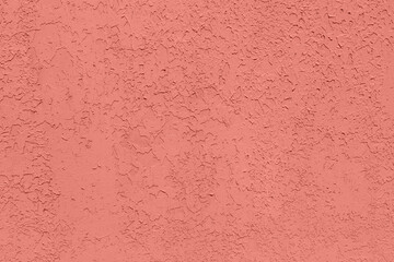 Coral pink colored low contrast Concrete textured background with roughness and irregularities. 2021 color trend.