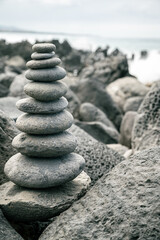 stack of stones on sea coast - Cairn