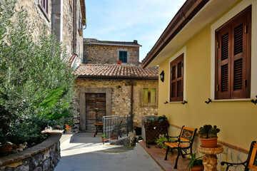 A narrow street among the old houses of Patrica, a medieval village in the Lazio region, Italy.

