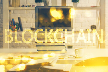 Multi exposure of blockchain and crypto economy theme hologram and table with computer background. Concept of bitcoin cryptocurrency.