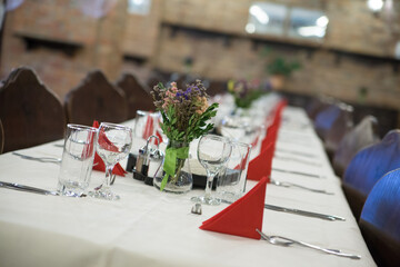 Beautiful table decoration details inside a restaurant prepared for a party