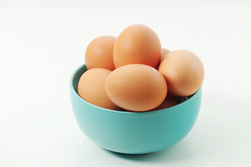 A bowl with chicken eggs	