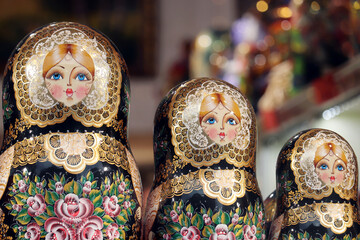 Russian nesting dolls in the souvenir shop window. Traditional wooden matryoshka dolls