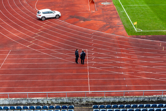 athletic stadium without spectators during a football match at the time of the coronavirus