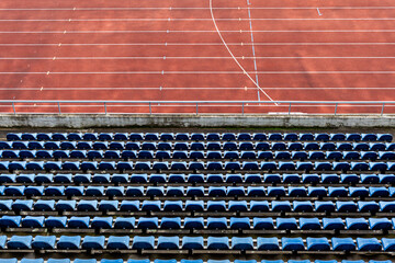 empty rows of seats in the auditorium of the athletic stadium © edojob