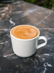 Cup of cappuccino coffee or latte.