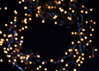 golden christmas frame of lights on black