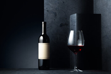 Red wine on a black background.