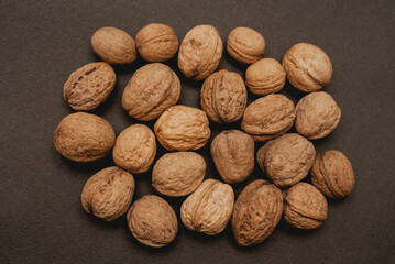walnuts on a black background, macro