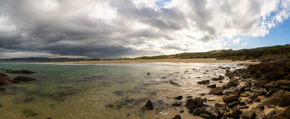 panorama view of the A Frouxeira beach in Galicia under an expressive sky