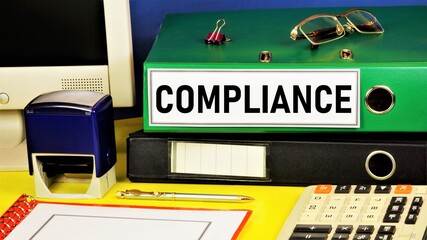 Compliance. Text label on the folder office of the Registrar. Important knowledge for future...