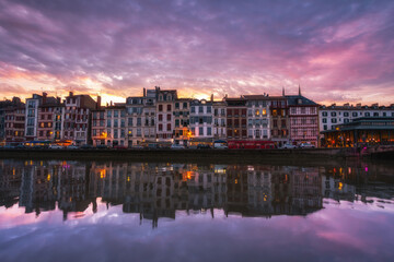 views of nive river in bayonne with traditional houses at background - obrazy, fototapety, plakaty