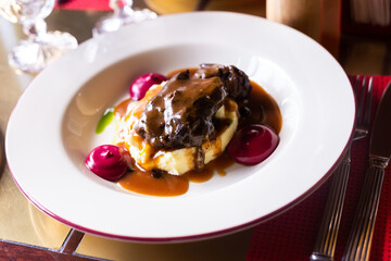 beef cheek with mashed potatoes and currant oil