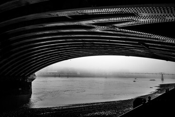 Under Blackfriars Bridge on a Foggy Day in London