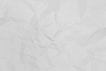 White crumpled paper texture background.