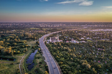 Drone aerial view of Siekierkowska Route and Siekierki Sanctuary church, Warsaw, capital of Poland