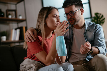 Young woman waiting results from the laboratory. Worried woman waiting Covid-19 test.
