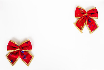 a blank with two red festive bows isolated on white background, christmas greeting card, copy space...