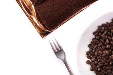 Traditional tiramisu cake isolated on white background. Top view