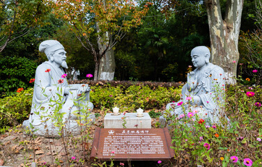 Sculpture of Su Dongpo, famous poet in Song dynasty, and Foyin, famous Buddhist monk discussing Buddhism in Jinshan Temple, Zhenjiang, Jiangsu, China.
