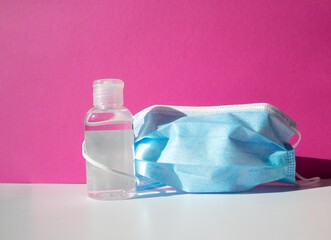 sanitary blue mask together with the hydroalcoholic disinfectant gel to eliminate virus and covid19 germs