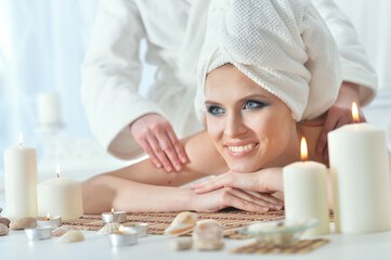 Close up portrait of girl lying down on a massage bed