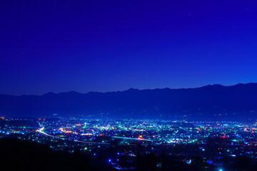 長野県飯田市　夜明け前の南アルプスと飯田市街