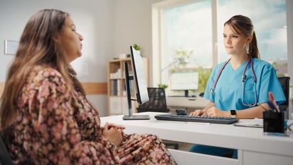 Doctor Consultation Office: Latin Female Patient Describes Symptoms to Experienced Head Nurse / Physician. Health Care Professional Explaining Test Results, Prescribing Medicine. Hispanic People