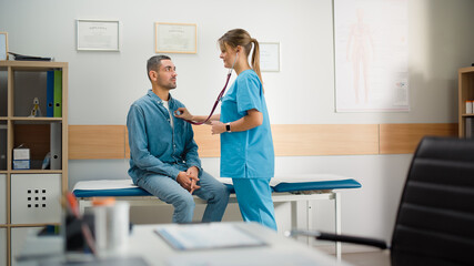 Obraz premium Doctor's Consultation Office: Head Nurse Uses Stethoscope to Listen to Heartbeat and Lungs of the Male Patient. Medical Health Care Professionals Diagnosing, Prescribing Medicine and Treatment Plan
