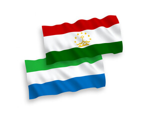 Flags of Tajikistan and Sierra Leone on a white background