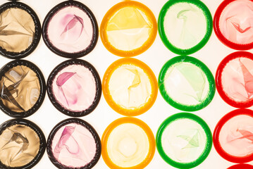 Colorful condoms background.