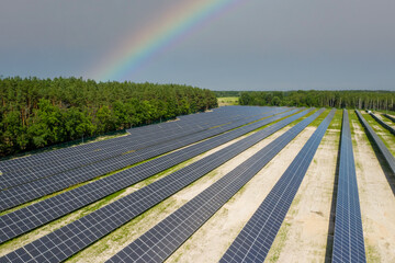 Solar station with a rainbow. Beautiful aerial view