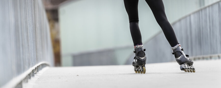young woman skating with inliner
