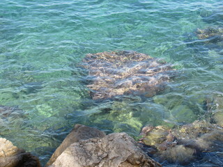 Fototapeta na wymiar Beautiful view of stones underwater on the Mediterranean seaside