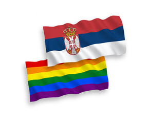 Flags of Rainbow gay pride and Serbia on a white background