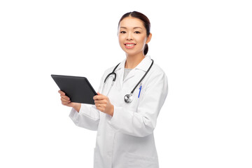 medicine, profession and healthcare concept - happy smiling asian female doctor in white coat with tablet pc computer and stethoscope