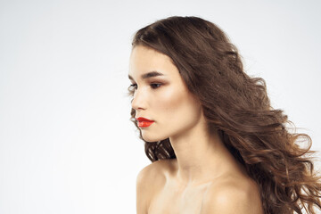 Elegant woman with bare shoulders red lips glamor attractive look cropped look