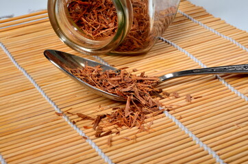 Catuaba bark  in a metal spoon. Natural herbal tea from Catuaba tree bark, Brazilian aphrodisiac