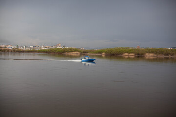 Fototapeta na wymiar boat floating on the river