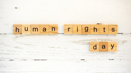 Human Rights Day.words from wooden cubes with letters photo