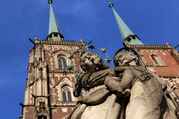 Statue in front of a Church in Wroclaw city