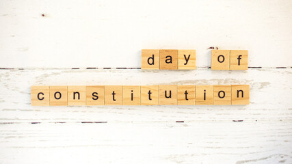 day of constitution.words from wooden cubes with letters photo