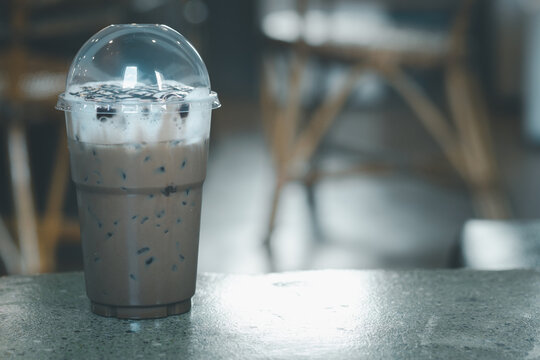 Delicious iced mocha coffee in plastic glass.
