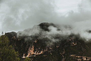 Mountain surrounded by mist in autumn