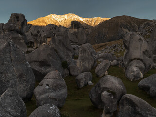 Fototapeta na wymiar Castle Hill high country station in New Zealand's South Island. The hill was so named because of the imposing array of limestone boulders in the area reminiscent of an old, run-down stone castle.