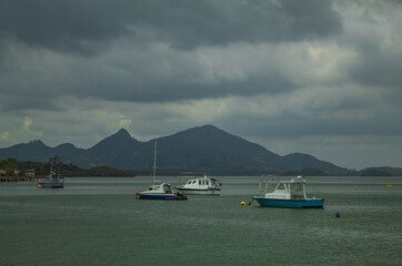 "boats docked at the port"