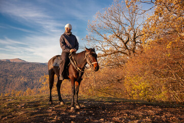  Man and horse, landscape autumn