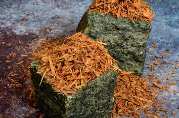 Catuaba bark  on stone cubes. Natural herbal tea from Catuaba tree bark, natural aphrodisiac from...