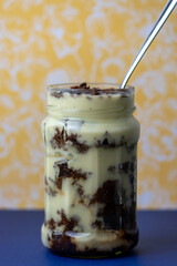 chocolate and vanilla trifle in a mason jar 